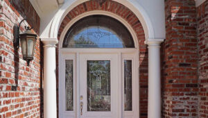 Beveled Glass Beauty Architectural accuracy is created on both the front and rear porches by using HB&G PermaCast columns. The custom entry door has leaded and beveled glass inserts that were created to provide a combination of both privacy and beauty to the entry hall.