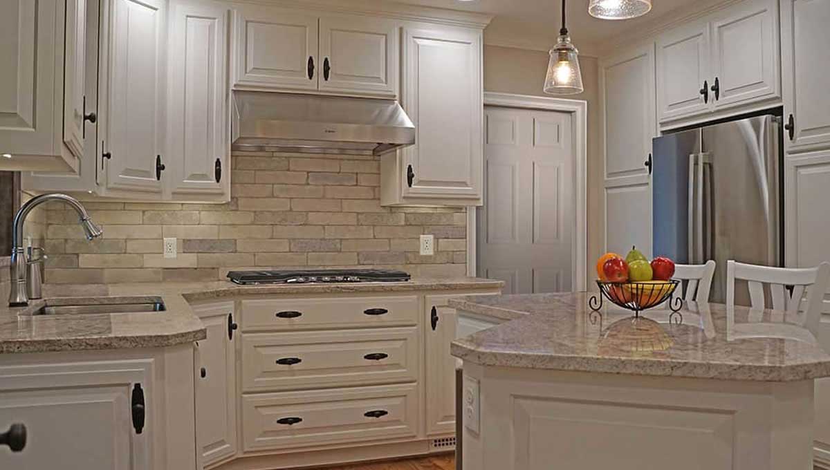 Florence Park Addition 2018 Kitchen Remodel Angled Elegance The uniquely shaped center island is the key design element in this new floor plan. An abundance of standard overlay cabinets doubled the storage for this kitchen
