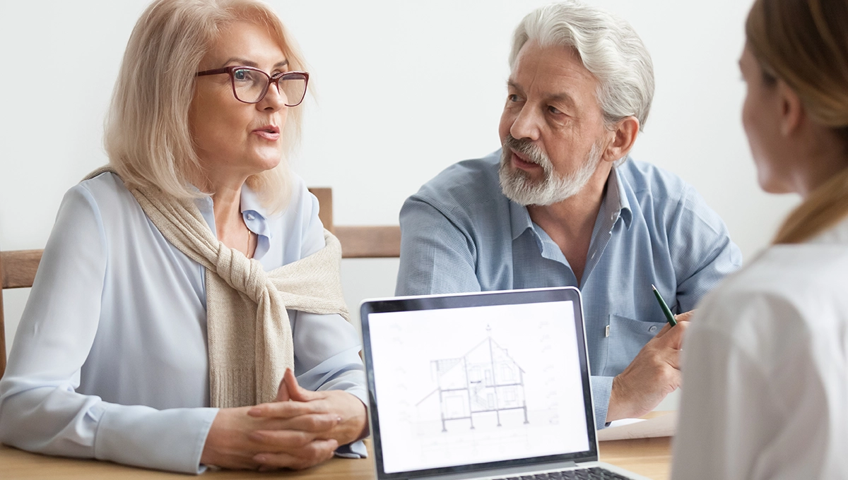 Discussing home renovation plans together.
