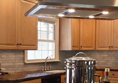 stainless steel and ash range hood